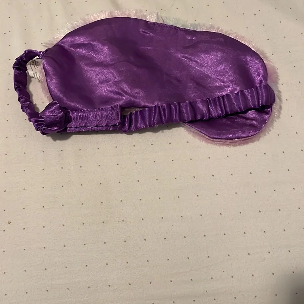 Lightly used - fuzzy eye sleeping mask